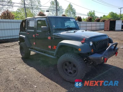 Czwarte zdjęcie samochodu z boku: 2009 JEEP WRANGLER UNLIMITED X VIN:1J4GA39189L752446 - miniatura