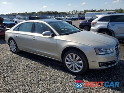 Czwarte zdjęcie samochodu z boku: 2016 AUDI A8 L QUATTRO VIN:WAU34AFD2GN011870 - miniatura