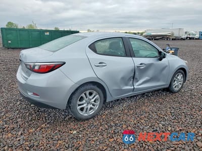 Trzecie zdjęcie samochodu z tyłu: 2017 TOYOTA YARIS IA BASE VIN:3MYDLBYV0HY179289 - miniatura
