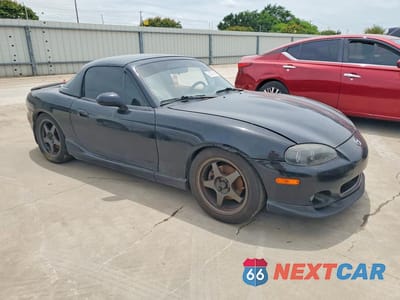 Czwarte zdjęcie samochodu z boku: 2002 MAZDA MX-5 MIATA BASE VIN:JM1NB353220226435 - miniatura