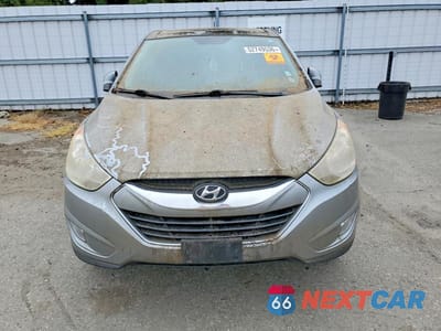 Piąte zdjęcie samochodu w środku: 2013 HYUNDAI TUCSON LIMITED VIN:KM8JU3AC9DU665279 - miniatura