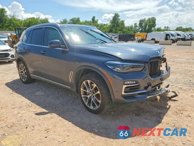Czwarte zdjęcie samochodu z boku: 2021 BMW X5 XDRIVE40I VIN:5UXCR6C04M9E78636 - miniatura
