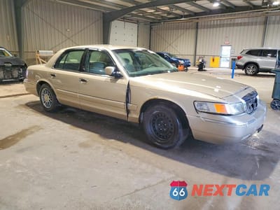 Czwarte zdjęcie samochodu z boku: 2000 MERCURY GRAND MARQUIS GS VIN:2MEFM74W3YX619127 - miniatura