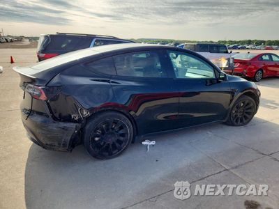 Trzecie zdjęcie samochodu z tyłu: 2022 TESLA MODEL Y VIN:7SAYGAEE7NF418611 - miniatura