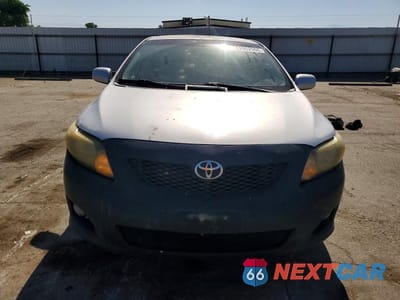 Piąte zdjęcie samochodu w środku: 2010 TOYOTA COROLLA LE VIN:1NXBU4EE7AZ201683 - miniatura