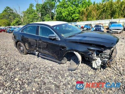 Czwarte zdjęcie samochodu z boku: 2014 FORD TAURUS POLICE INTERCEPTOR VIN:1FAHP2MKXEG175074 - miniatura