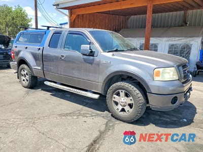 Czwarte zdjęcie samochodu z boku: 2007 FORD F150 VIN:1FTPX045X7KC64602 - miniatura