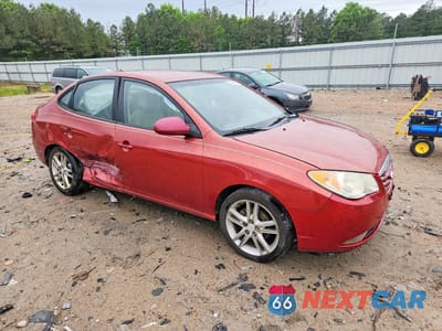 Czwarte zdjęcie samochodu z boku: 2010 HYUNDAI ELANTRA VIN:KMHDU4AD5AU831174 - miniatura