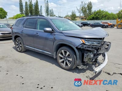 Czwarte zdjęcie samochodu z boku: 2025 HONDA PILOT TOURING VIN:5FNYG1H73SB032659 - miniatura
