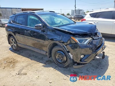 Czwarte zdjęcie samochodu z boku: 2017 TOYOTA RAV4 XLE VIN:2T3WFREVXHW374821 - miniatura