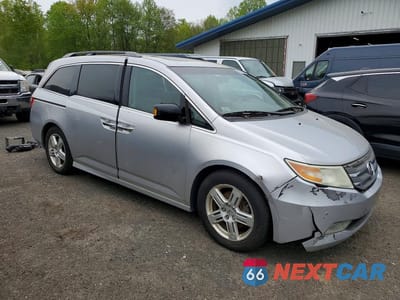 Czwarte zdjęcie samochodu z boku: 2012 HONDA ODYSSEY TOURING VIN:5FNRL5H98CB083567 - miniatura