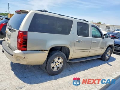 Trzecie zdjęcie samochodu z tyłu: 2010 CHEVROLET SUBURBAN K1500 LT VIN:1GNUKJE31AR140776 - miniatura
