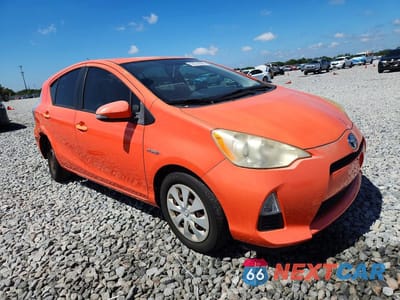 Czwarte zdjęcie samochodu z boku: 2013 TOYOTA PRIUS C ONE VIN:JTDKDTB31D1050282 - miniatura