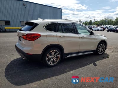 Trzecie zdjęcie samochodu z tyłu: 2016 BMW X1 XDRIVE28I VIN:WBXHT3Z38G4A51683 - miniatura