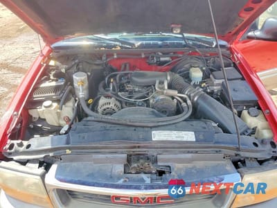 Zdjęcie 12 z 13 samochodu: 1998 GMC JIMMY VIN:1GKDT13W9W2544951 - miniatura