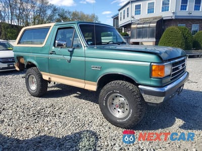 Czwarte zdjęcie samochodu z boku: 1990 FORD BRONCO VIN:1FMEU15H5LLA03179 - miniatura