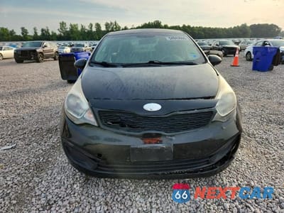 Piąte zdjęcie samochodu w środku: 2013 KIA RIO LX VIN:KNADM4A37D6310930 - miniatura