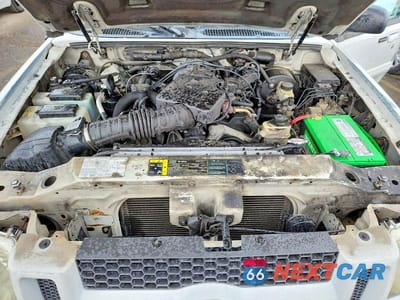 Zdjęcie 11 z 13 samochodu: 2004 FORD EXPLORER SPORT TRAC VIN:1FMZU77KX4UB69710 - miniatura