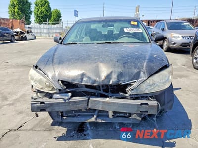 Piąte zdjęcie samochodu w środku: 2005 TOYOTA CAMRY LE VIN:4T1BE32K05U023574 - miniatura