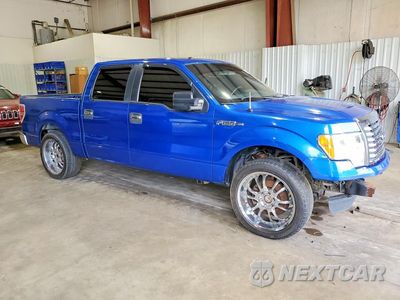 Czwarte zdjęcie samochodu z boku: 2012 FORD F150 SUPERCREW VIN:1FTFW1CF7CFA47266 - miniatura