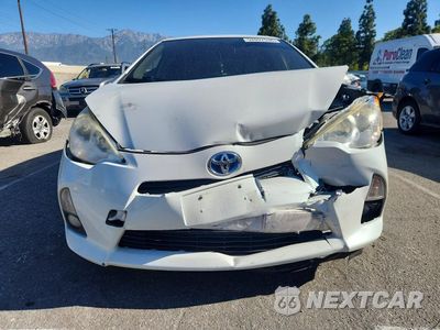 Piąte zdjęcie samochodu w środku: 2014 TOYOTA PRIUS C FOUR VIN:JTDKDTB32E1064371 - miniatura