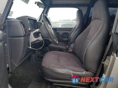 Zdjęcie 7 z 13 samochodu: 2002 JEEP WRANGLER / TJ SPORT VIN:1J4FA49S52P723947 - miniatura