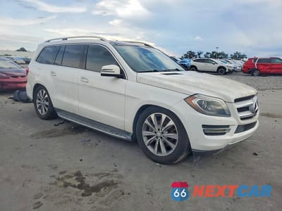 Czwarte zdjęcie samochodu z boku: 2014 MERCEDES-BENZ GL 450 4MATIC VIN:4JGDF7CE7EA423509 - miniatura