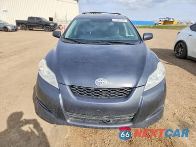 Piąte zdjęcie samochodu w środku: 2010 TOYOTA MATRIX WAGON 4WD VIN:2T1LE4EE7AC013670 - miniatura