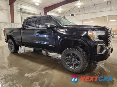 Czwarte zdjęcie samochodu z boku: 2021 GMC SIERRA K1500 AT4 VIN:1GTU9EETXMZ175235 - miniatura