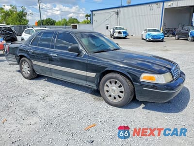 Czwarte zdjęcie samochodu z boku: 2007 FORD CROWN VICTORIA LX VIN:2FDFP74V17X103341 - miniatura