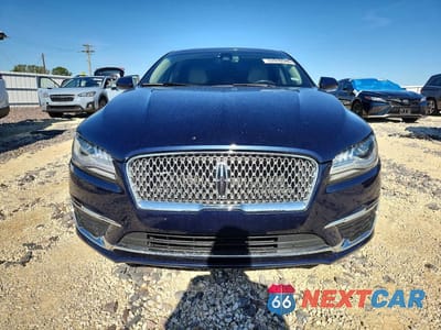 Piąte zdjęcie samochodu w środku: 2017 LINCOLN MKZ RESERVE VIN:3LN6L5F90HR659689 - miniatura