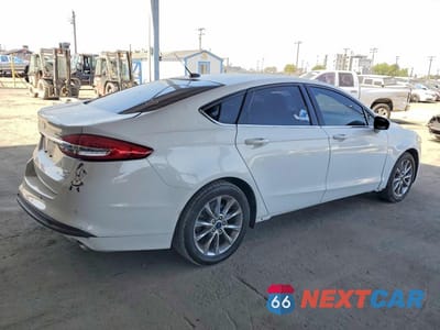 Trzecie zdjęcie samochodu z tyłu: 2017 FORD FUSION SE HYBRID VIN:3FA6P0LU8HR302030 - miniatura