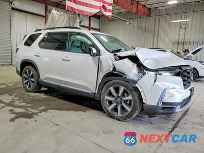 Czwarte zdjęcie samochodu z boku: 2025 HONDA PILOT TOURING VIN:5FNYG1H77SB022331 - miniatura