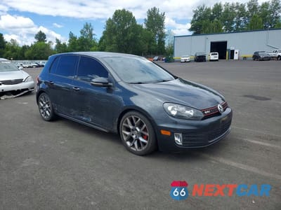 Czwarte zdjęcie samochodu z boku: 2013 VOLKSWAGEN GOLF VIN:WVWHV7AJ0DW129685 - miniatura