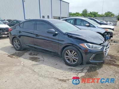 Czwarte zdjęcie samochodu z boku: 2018 HYUNDAI ELANTRA VALUE EDITION VIN:5NPD84LF0JH349701 - miniatura
