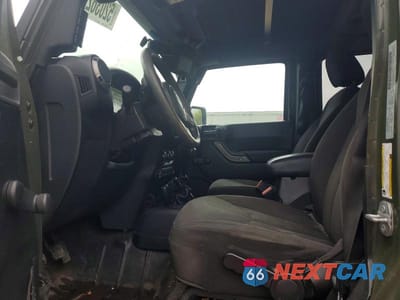 Zdjęcie 7 z 13 samochodu: 2015 JEEP WRANGLER UNLIMITED SPORT VIN:1C4BJWDG7FL703134 - miniatura