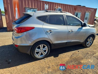 Trzecie zdjęcie samochodu z tyłu: 2012 HYUNDAI TUCSON GLS VIN:KM8JUCAC2CU529462 - miniatura