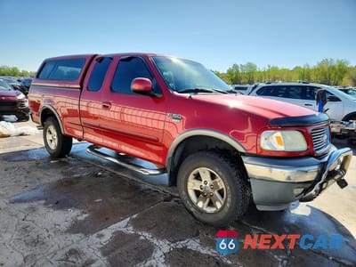 Czwarte zdjęcie samochodu z boku: 2002 FORD F150 VIN:1FTRX18L52NB47637 - miniatura