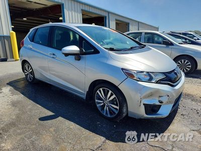 Czwarte zdjęcie samochodu z boku: 2015 HONDA FIT VIN:3HGGK5H82FM753438 - miniatura