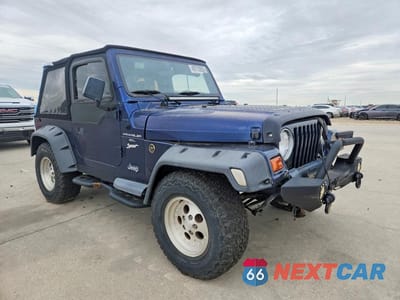 Czwarte zdjęcie samochodu z boku: 1997 JEEP WRANGLER / TJ SPORT VIN:1J4FY19S3VP505522 - miniatura