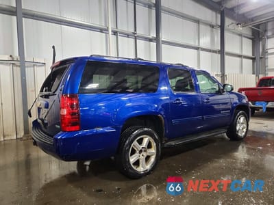 Trzecie zdjęcie samochodu z tyłu: 2012 CHEVROLET SUBURBAN K1500 LT VIN:1GNSKJE76CR173219 - miniatura