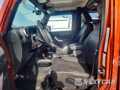 Zdjęcie 7 z 13 samochodu: 2014 JEEP WRANGLER UNLIMITED SAHARA VIN:1C4BJWEG2EL252028 - miniatura