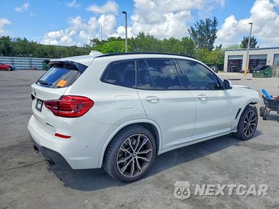 Trzecie zdjęcie samochodu z tyłu: 2021 BMW X3 M VIN:5UXTS1C06M9F29559 - miniatura