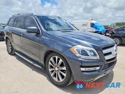 Czwarte zdjęcie samochodu z boku: 2016 MERCEDES-BENZ GL 450 4MATIC VIN:4JGDF6EE5GA671025 - miniatura