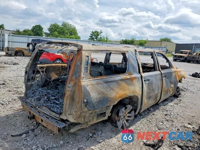 Trzecie zdjęcie samochodu z tyłu: 2018 CHEVROLET SUBURBAN K1500 LT VIN:1GNSKHKC5JR142437 - miniatura