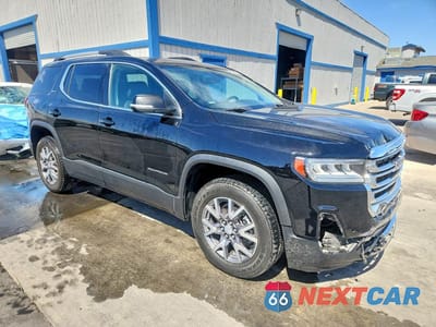 Czwarte zdjęcie samochodu z boku: 2023 GMC ACADIA SLT VIN:1GKKNML4XPZ130314 - miniatura