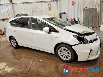 Czwarte zdjęcie samochodu z boku: 2014 TOYOTA PRIUS V TWO VIN:JTDZN3EU1E3354637 - miniatura
