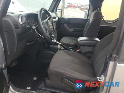 Zdjęcie 7 z 13 samochodu: 2016 JEEP WRANGLER SPORT VIN:1C4AJWAGXGL257496 - miniatura