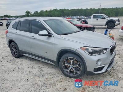 Czwarte zdjęcie samochodu z boku: 2016 BMW X1 XDRIVE28I VIN:WBXHT3Z30G4A50978 - miniatura
