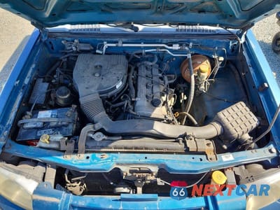 Zdjęcie 11 z 12 samochodu: 2001 NISSAN FRONTIER KING CAB XE VIN:1N6DD26S01C333502 - miniatura